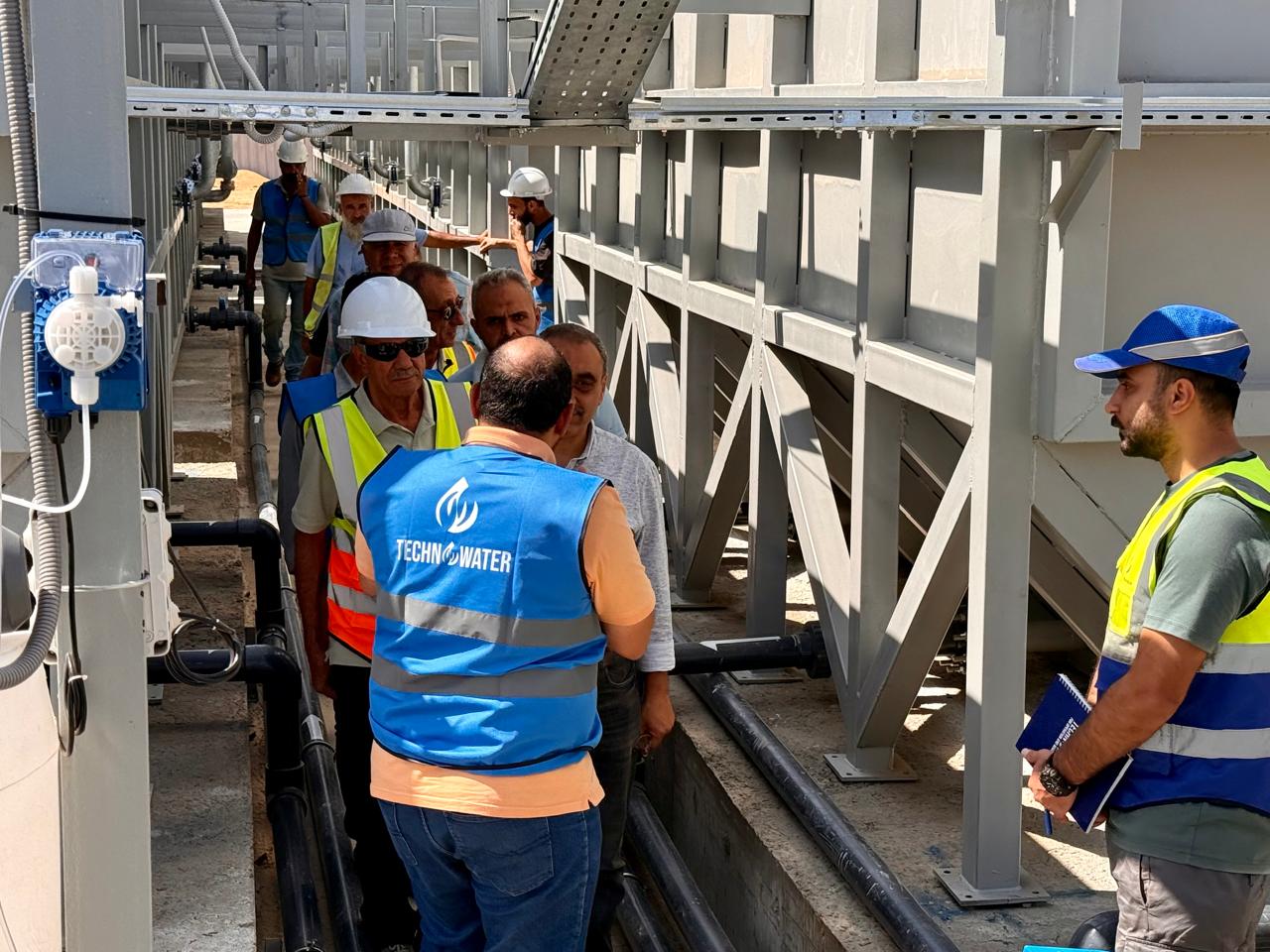Technowater team on site with the company logo visible on a blue vest
